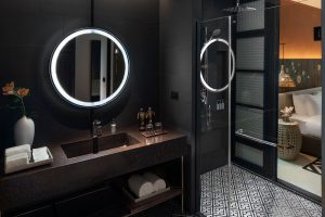Deluxe Pool Access Room with Stylish Bathroom, Featuring Separate Toilet and Shower Areas